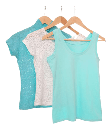 Three light summer tops on wooden hangers